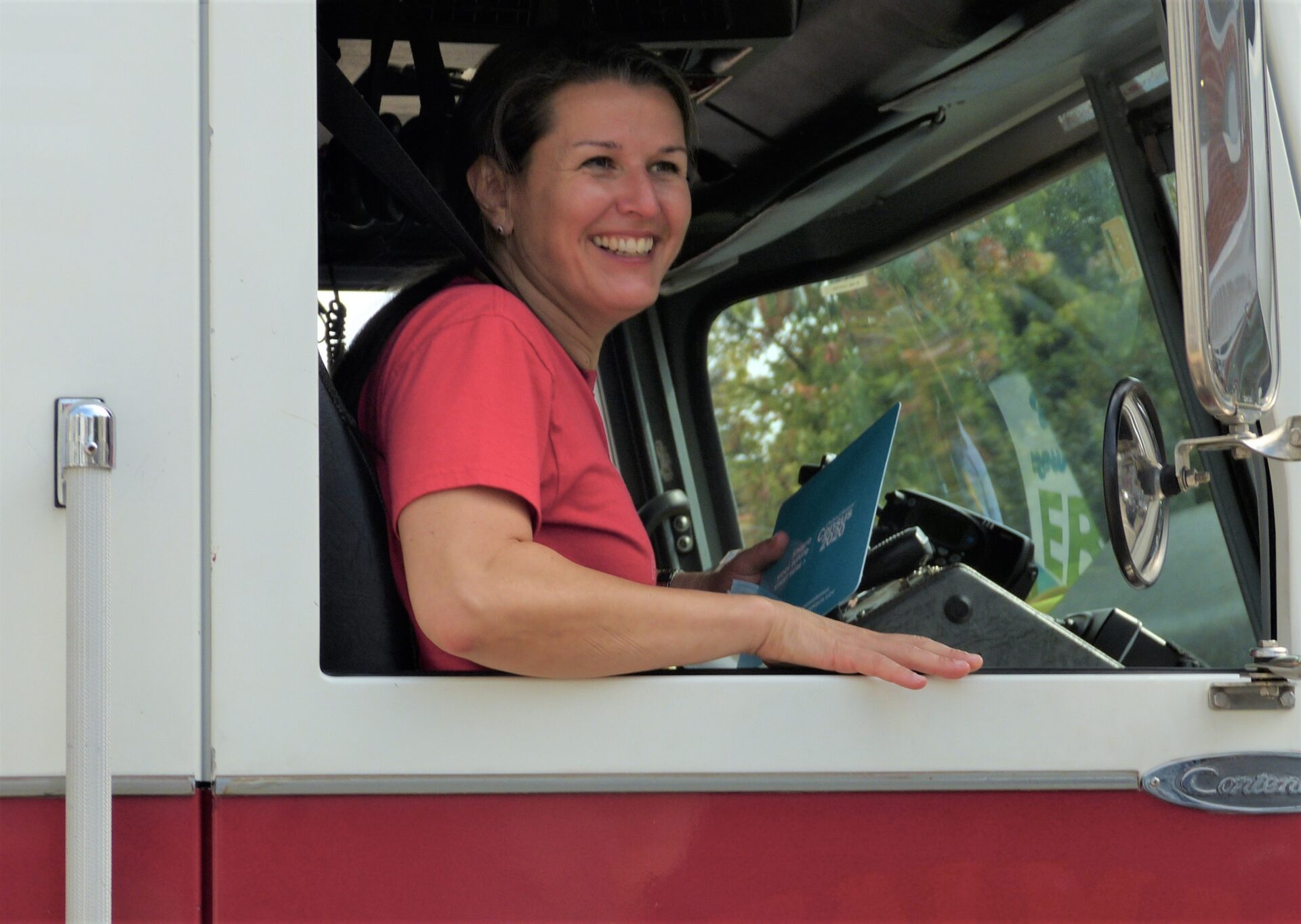 Lancaster Mayor Danene Sorace smiles from the passenger seat of a fire truck as she rides through city neighborhoods for Census Emergency Day on Friday, Sept. 25, 2020. (Photo: Tim Stuhldreher) 