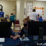 Staff members check in residents for their appointments (Photo: Olivia Smucker)