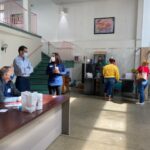 Staff from Rite Aid, at left, wait for patients to come through. (Photo: Olivia Smucker)