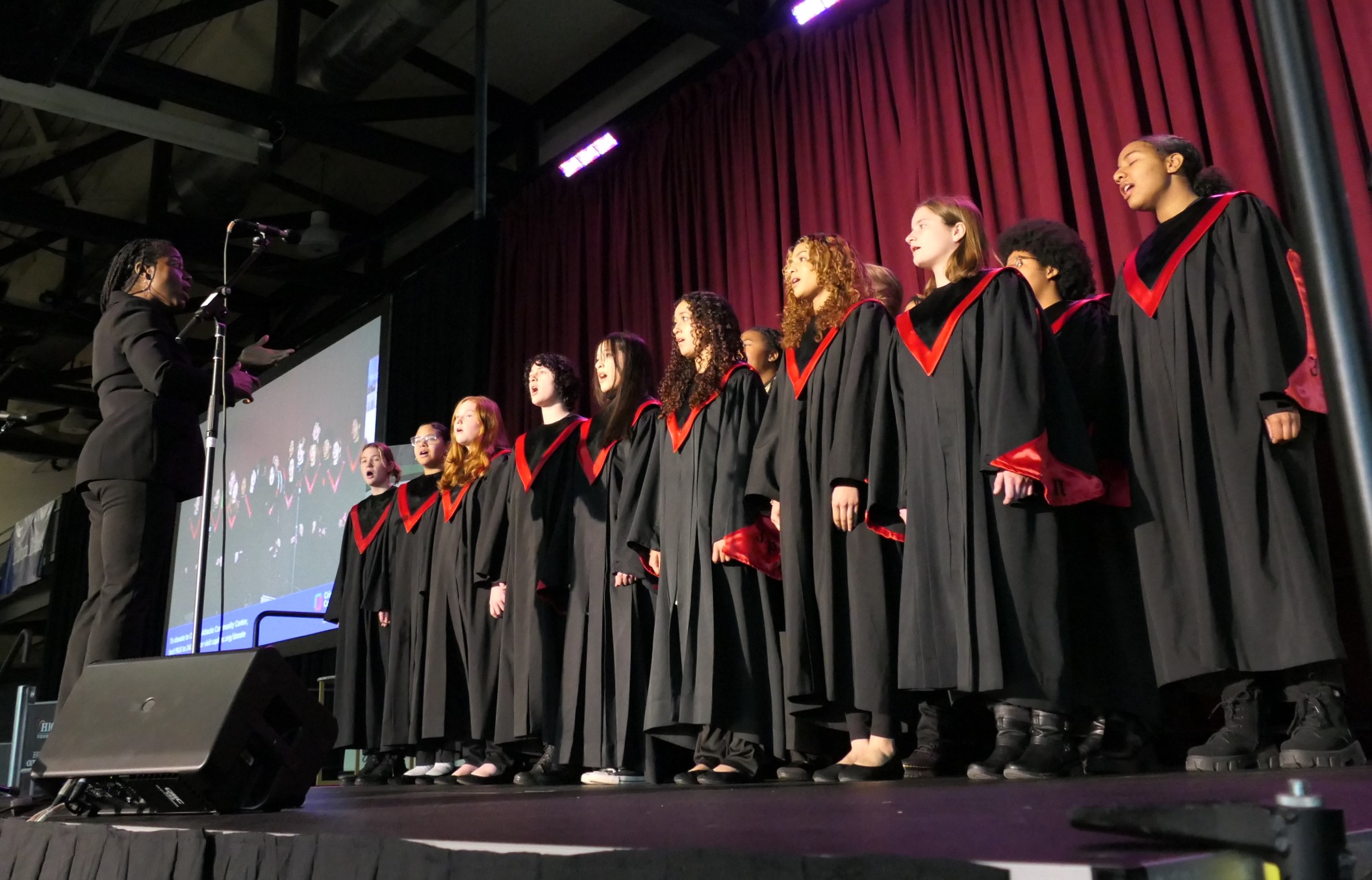 Colette Stephens, left, directs the McCaskey High School Voices of Freedom Choir at the MLK Breakfast at Millersville University's Student Memorial Center on Monday, Jan. 15, 2024. (Photo: Tim Stuhldreher) 