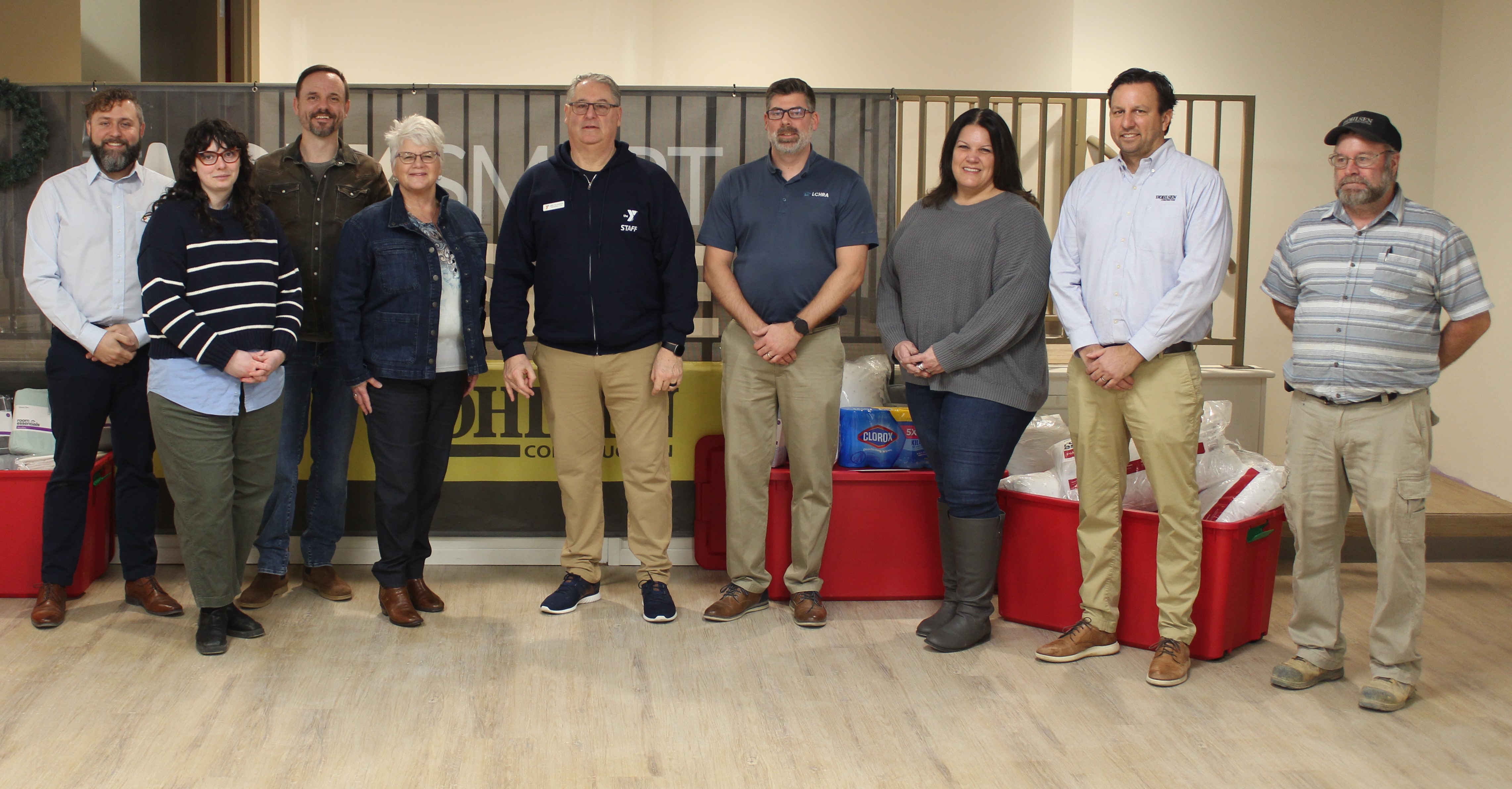 Members of the team involved in getting the shelter ready to open. From left: Josiah Huyard (outreach & emergency shelter coordinator, Homelessness Coalition); Jocelynn Naples (director of communications, development & special projects, Redevelopment Authority) Chris Eden (pastor, Otterbein UM Church); Deb Jones (director, Homelessness Coalition), Larry Richardson (CEO, YMCA of the Roses);  Justin Eby (executive director, Redevelopment Authority); and Wohlsen Construction's Erin Hess (project manager),  (project executive) and Dennis Boltz (superintendent). (Photo: Brian McCloud)
